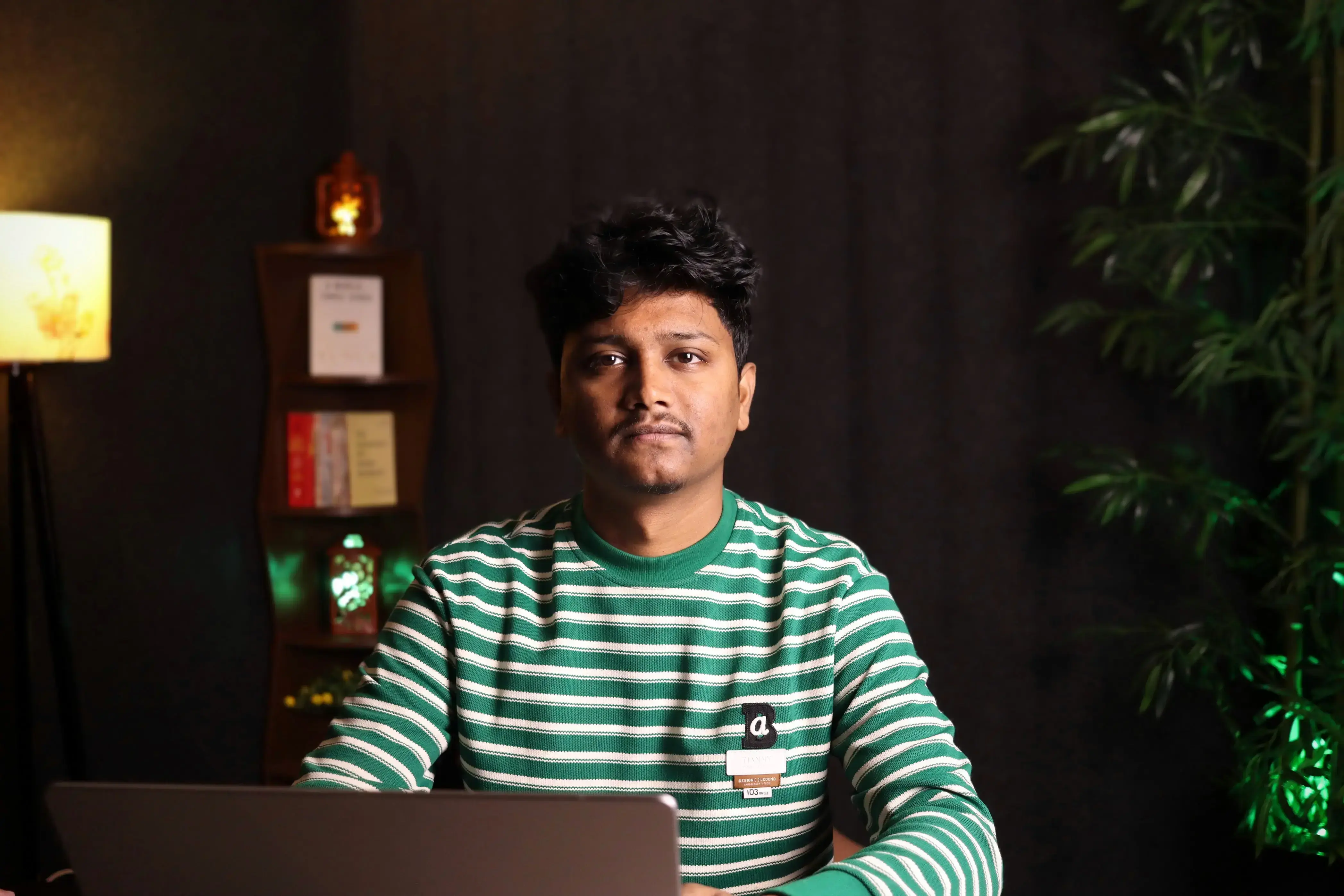 Nasim working focused in the studio environment